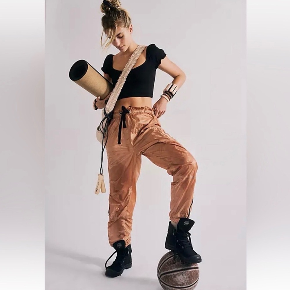 Free People Movement Back to the Future Parachute Zip Wind Pants in Copper.